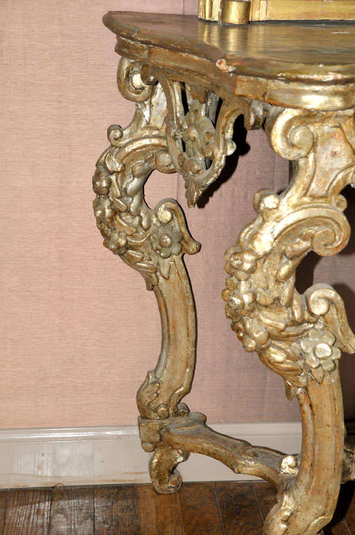An 18th century French Regence carved silvered wood console table, circa 1720 1