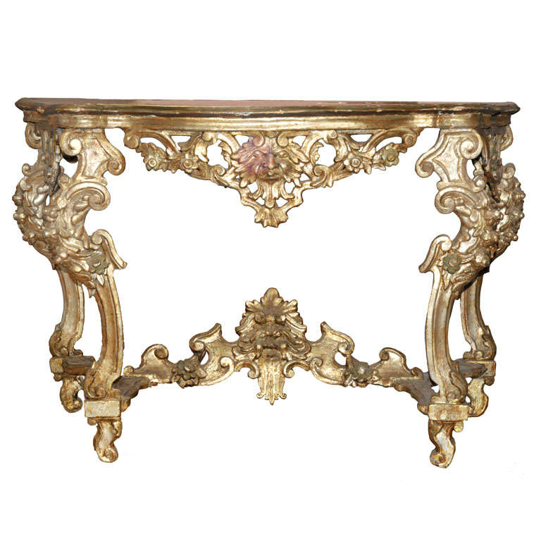 An 18th century French Regence carved silvered wood console table, circa 1720