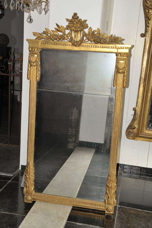 Giltwood A large 18th century French Louis XVI giltwood mirror, circa 1780