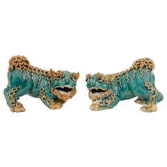 Pair Chinese Glazed Earthenware Crouching Lions, 20th C.