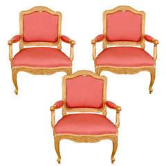 A Set Of Three Swedish Rococo Carved Giltwood Armchairs