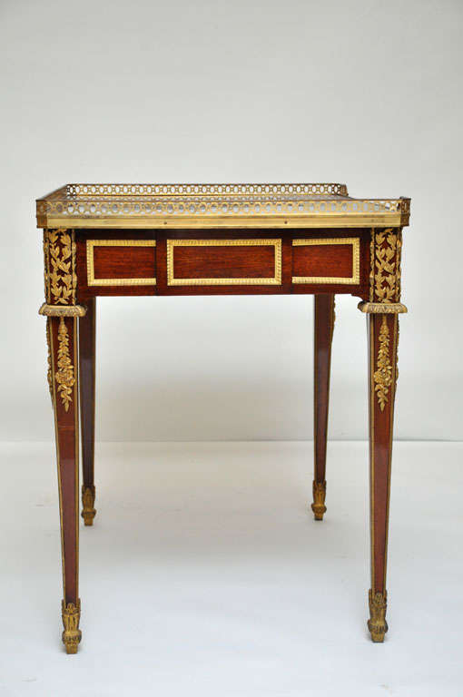 French Neoclassical writing table after a model by Jean-Henri Riesener, France, 1860 For Sale
