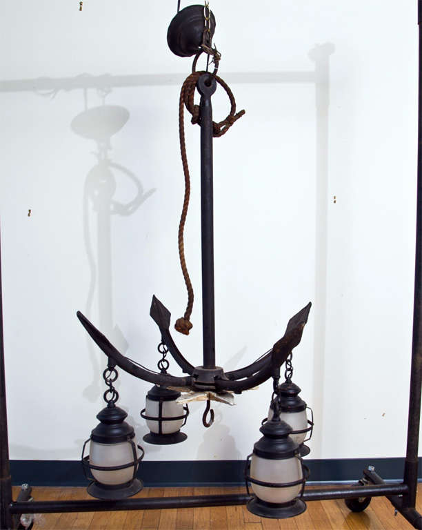 Black iron anchor with four lanterns.  Suspended starfish at base.  There is a second matching chandelier available for additional.  $2850.00