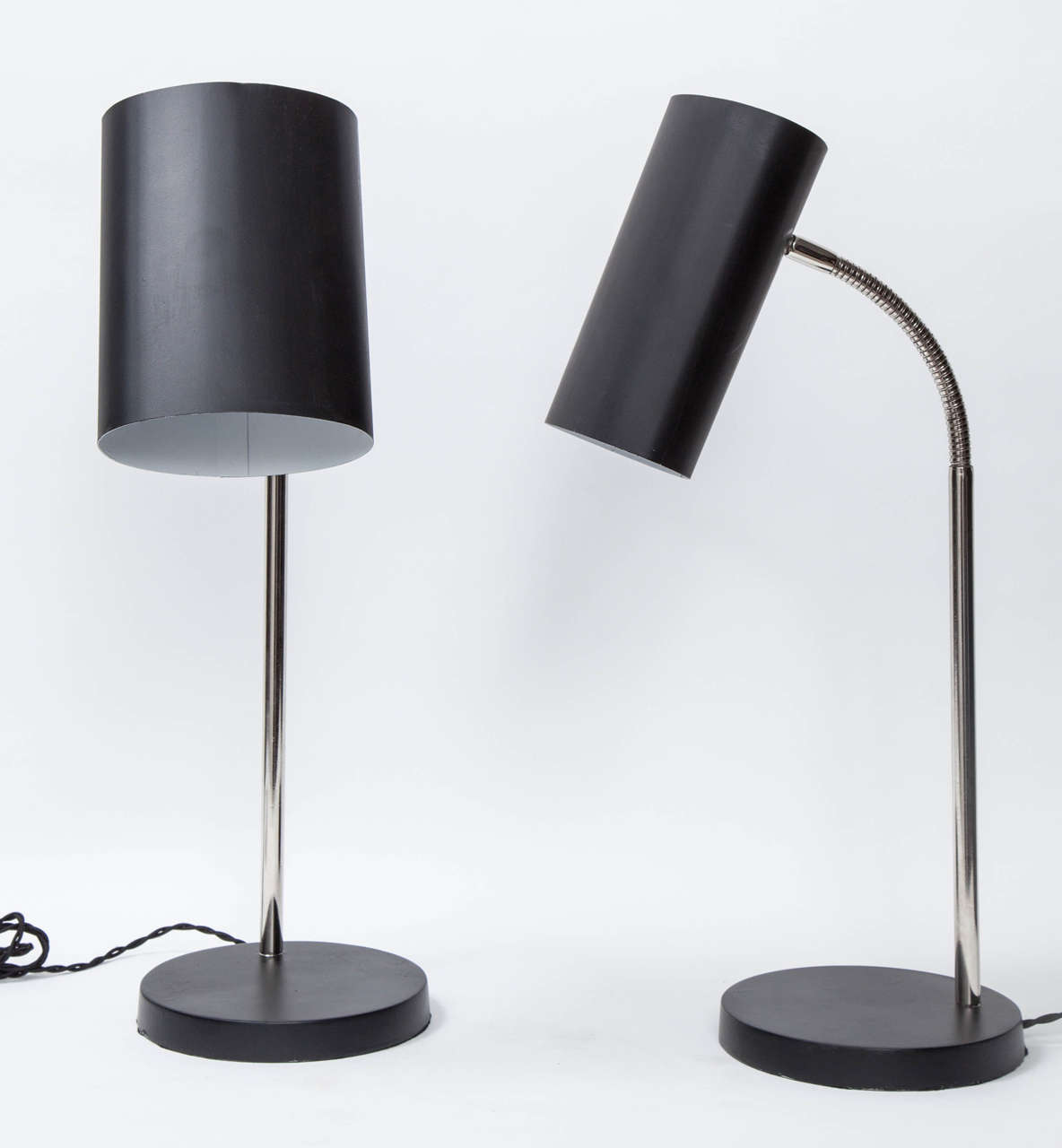 Black painted steel bases and oval cylinder shades joined by a polished nickel flexible neck. Newly restored and rewired for US usage, 1950s.