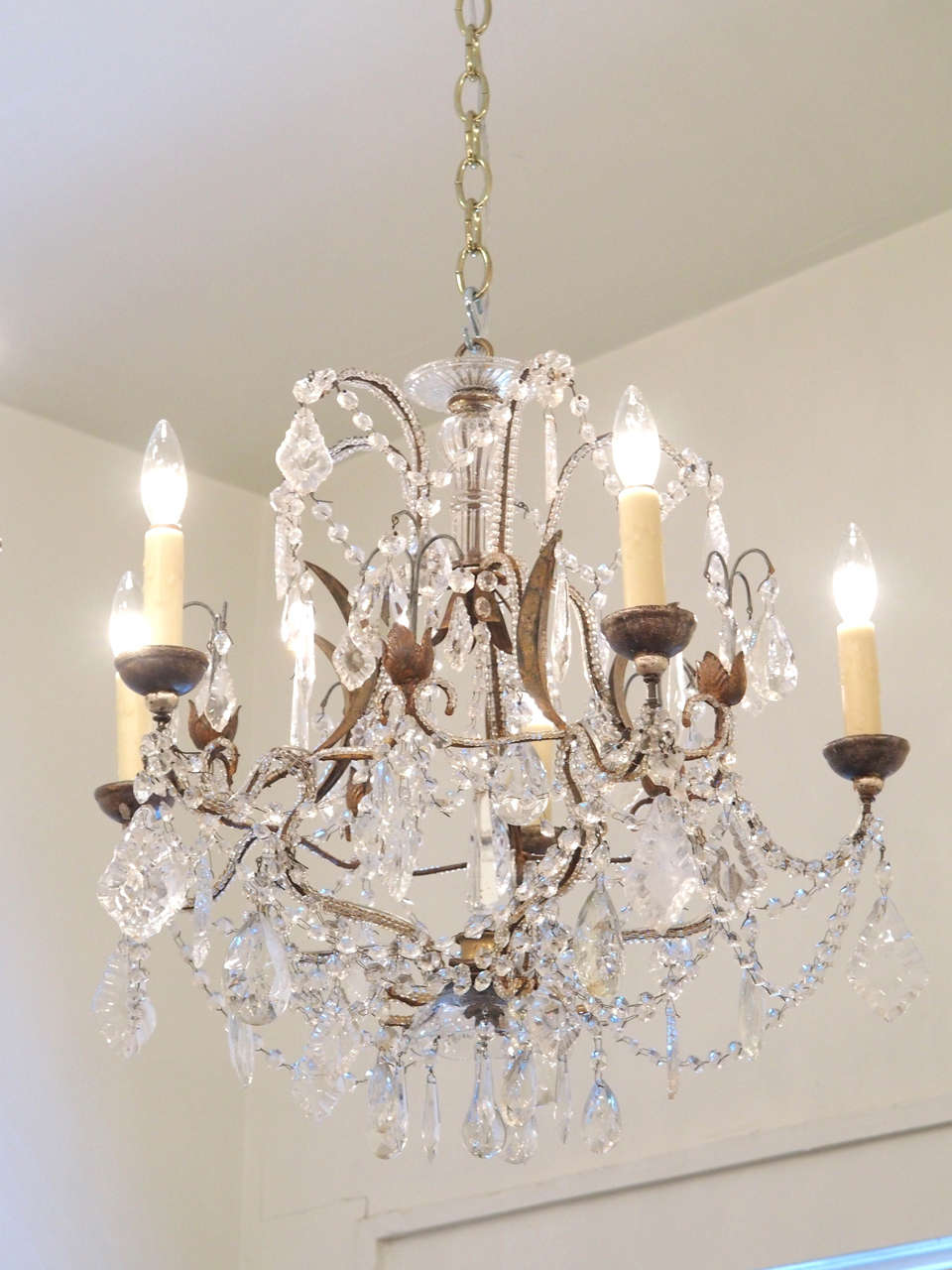 Pair of late 19th century Italian iron and crystal chandeliers.
