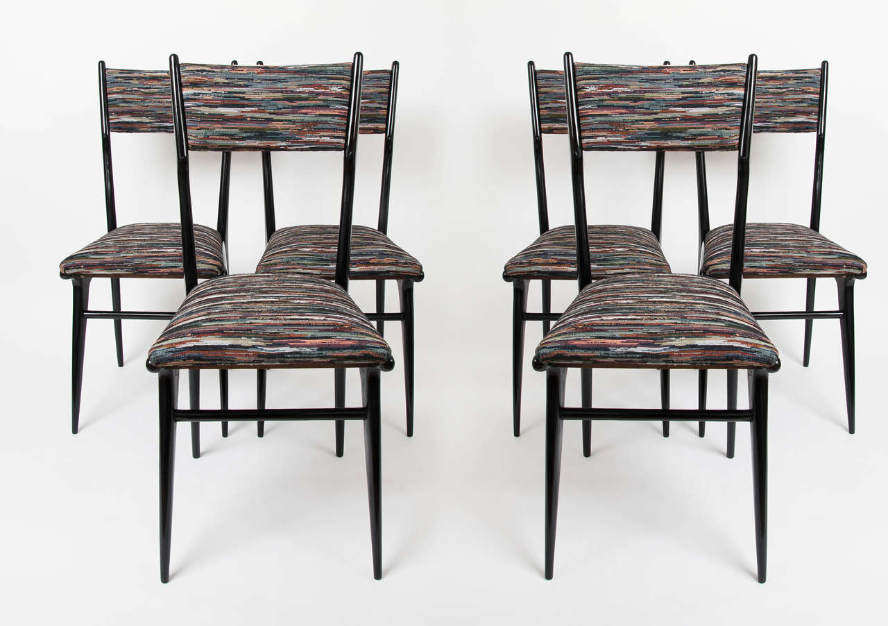 1950s set of six Italian ebonized dining chairs. Reupholstered.