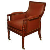 A French Regence Style Mahogany and Leather Upholstered Bergere