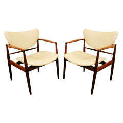 Pair Of Finn Juhl Arm Chairs in White Leather.