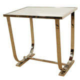 An Art Deco Chrome and Mirrored Glass End Tables.