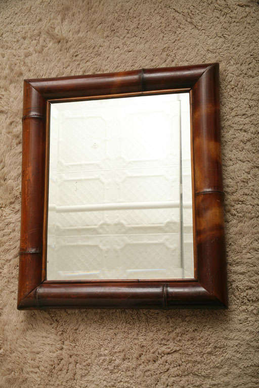 Pair of bamboo-framed wall mirrors. 

Provenance:

From the collection of Yves Saint Laurent and Pierre Berge, Paris.