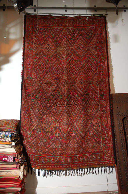 Vintage African Moroccan tribal rug, could be used both side, one side is flat-weave has a wonderful intricate geometric designs, and the other side is red lush wool long piles. Could be used as a rug runner.
Handmade in Morocco by the Berber women,
