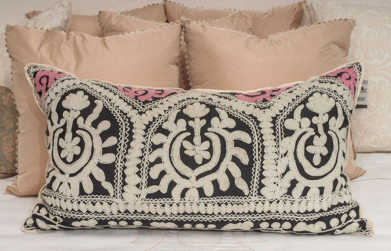 Beautiful Vintage Suzani from Uzbekistan. Hand embroidered pink and ecru colors on black backed with soft pink cotton linen. Down filled pillow. 
B.Viz Design