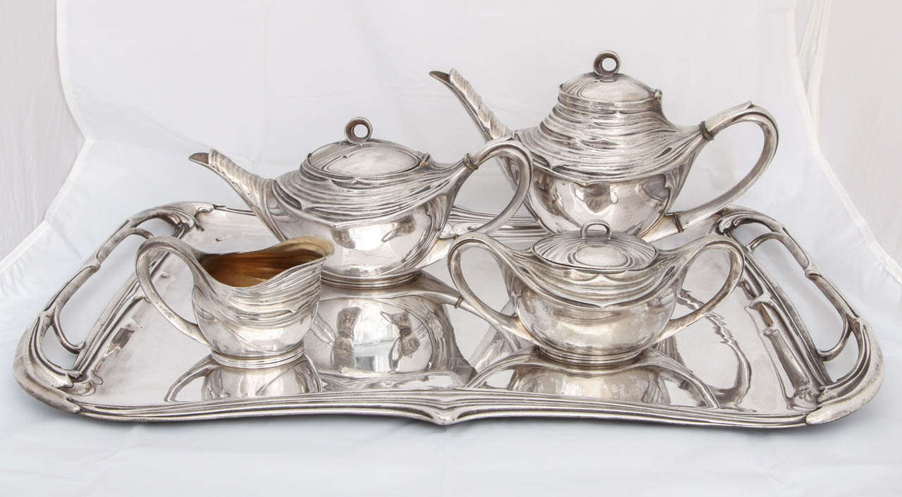 A WMF  Art Nouveau Pewter Tea and Coffee Service, circa 1904, Germany retailed by Casa Costa, in Argentina.

 Tray: 24