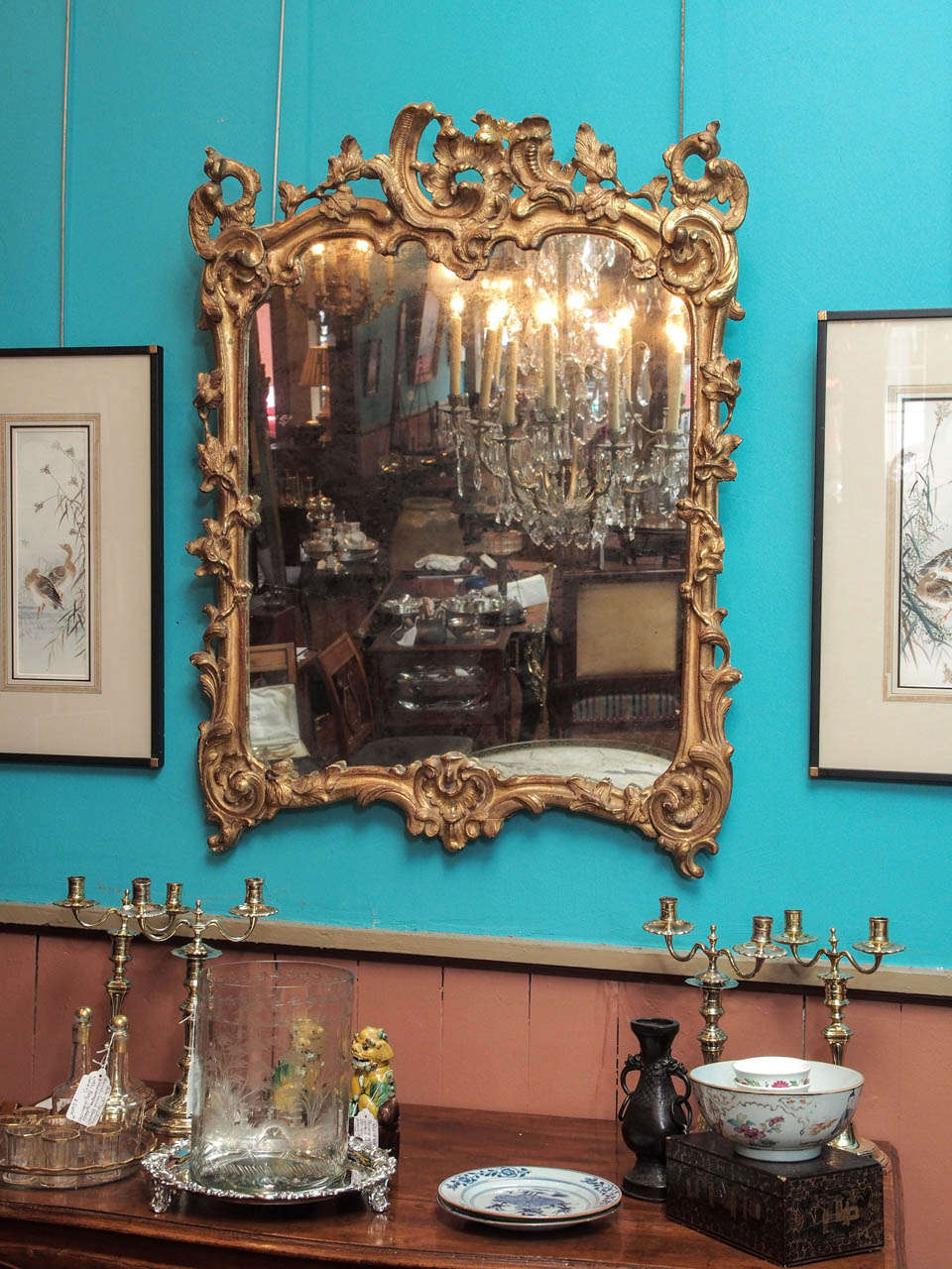 Very fine early 18th century French Regence period carved and gilded mirror in unusual shape, circa 1740.