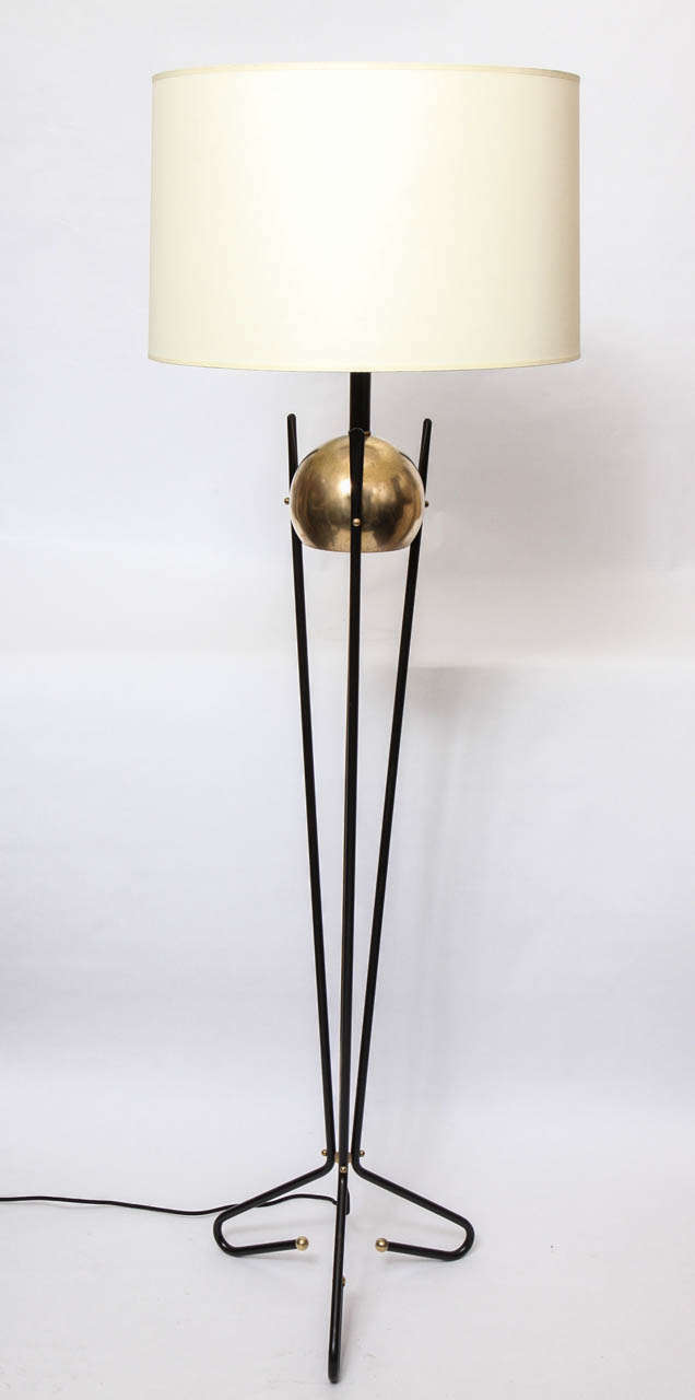 A 1940's Art Moderne brass and iron Floor Lamp