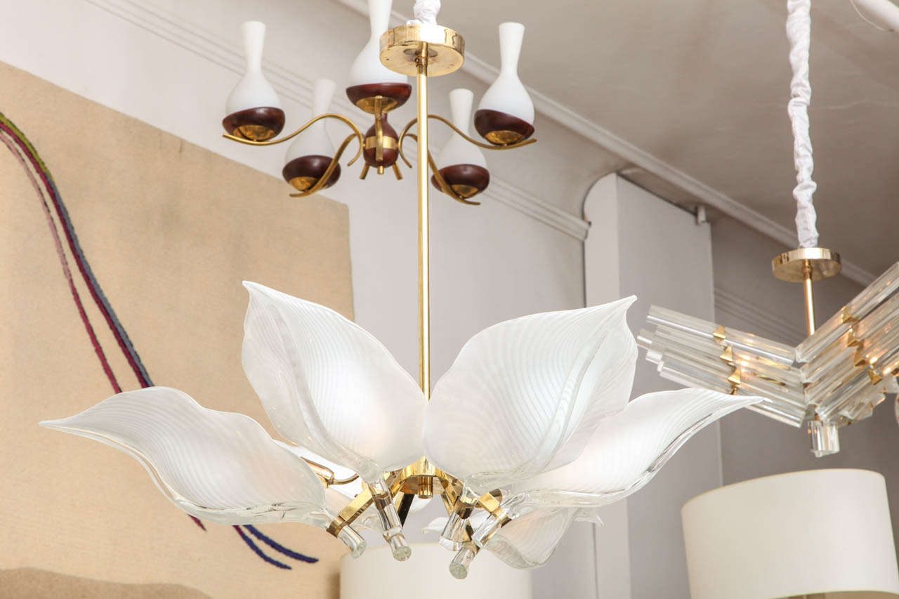 A 1960s sculptural ceiling fixture, composed of six Murano glass leaf shades by Franco Luce, with brass mounts.