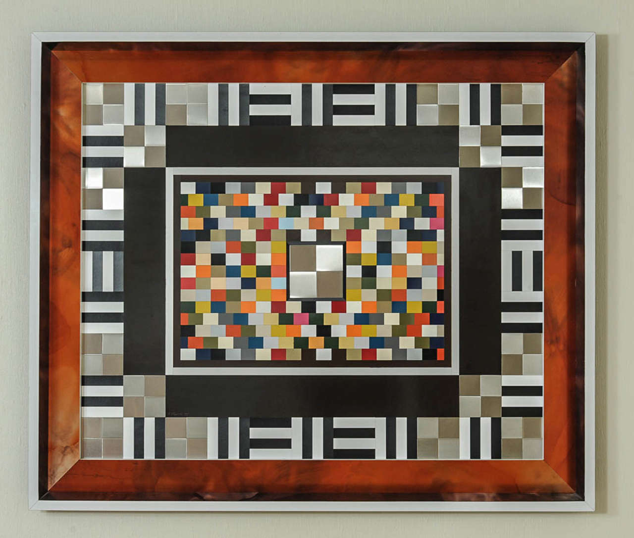 Stunning piece of art from the 1970s.
It is made out of tiny blocks of aluminium and formica, in a frame providing for depth.
Measures: 91 x 107cm
Signed E. Segura, 1975.