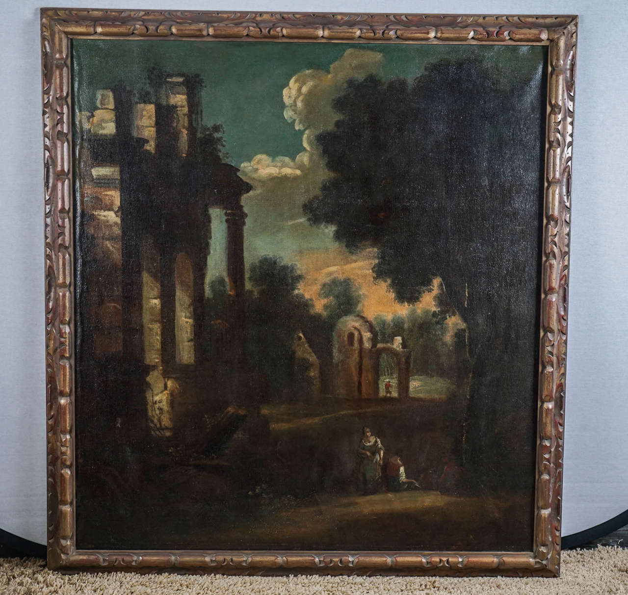 Rare as a pair of left and right works that survive together this pair of paintings are Italian. Romantic and bucolic with ruins and peasants at work amongst the remains of Rome's great past. Created as work to feed the ever-growing desire of