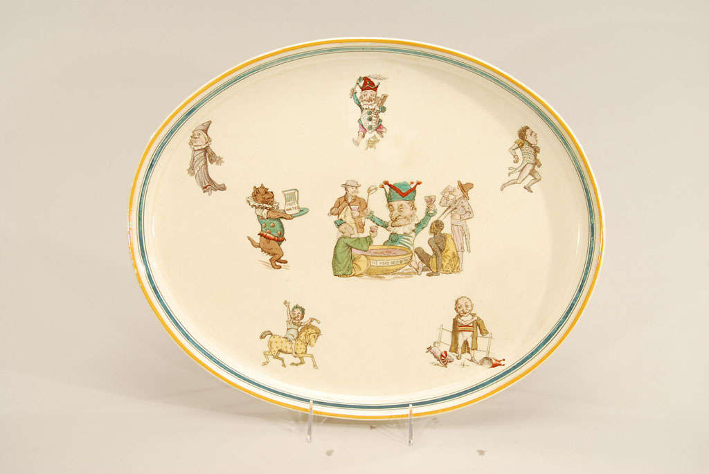 Questo grande vassoio o piatto da portata in crema è realizzato da Wedgwood e raffigura tutto 