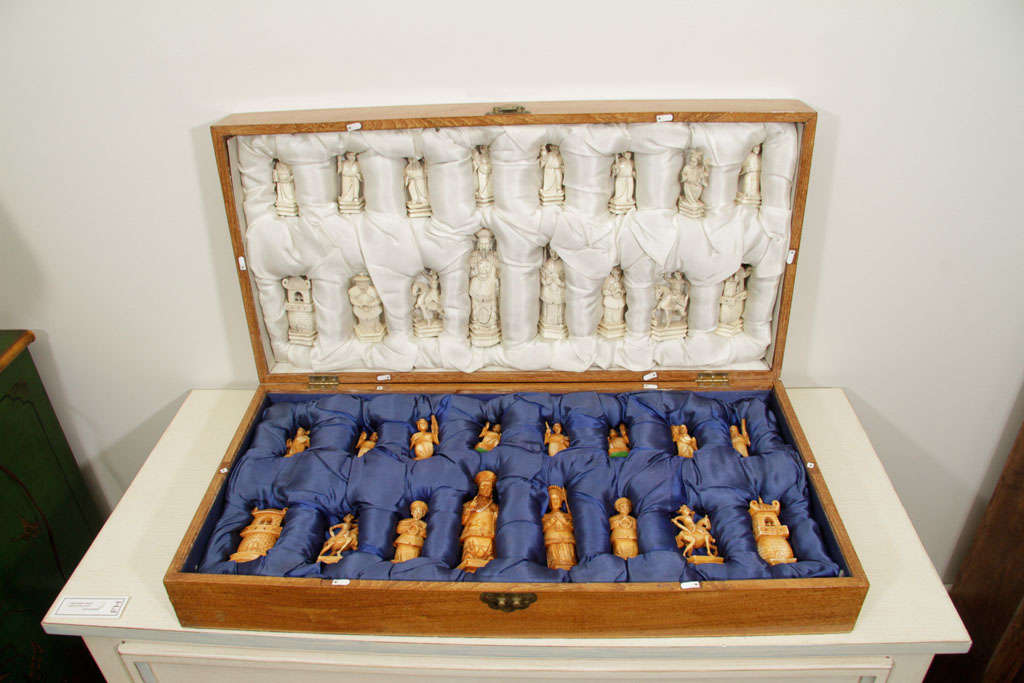 Beautiful hand carved ivory chess set in fabulous condition. This wonderful set is very desirable and has great over-sized pieces. Perfect to put on a game table or stand on its own box which doubles as a chess board. These beautiful objects can