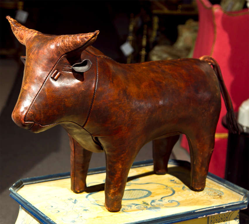 Cute English vintage leather bull for Abercrombie & Fitch store display, worn leather surface.