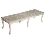 A Louis XV Style Cream and Grey Painted Caned Long Bench