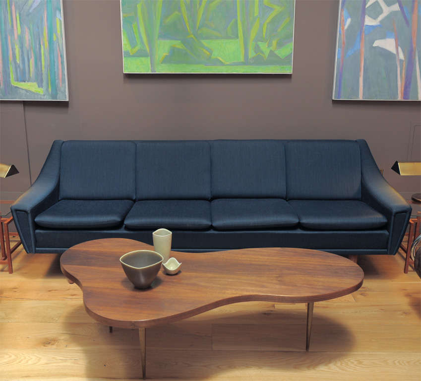 Danish furniture manufacturer, Four-seater sofa upholstered with blue upholstery, round tapered legs of teak. 1960.