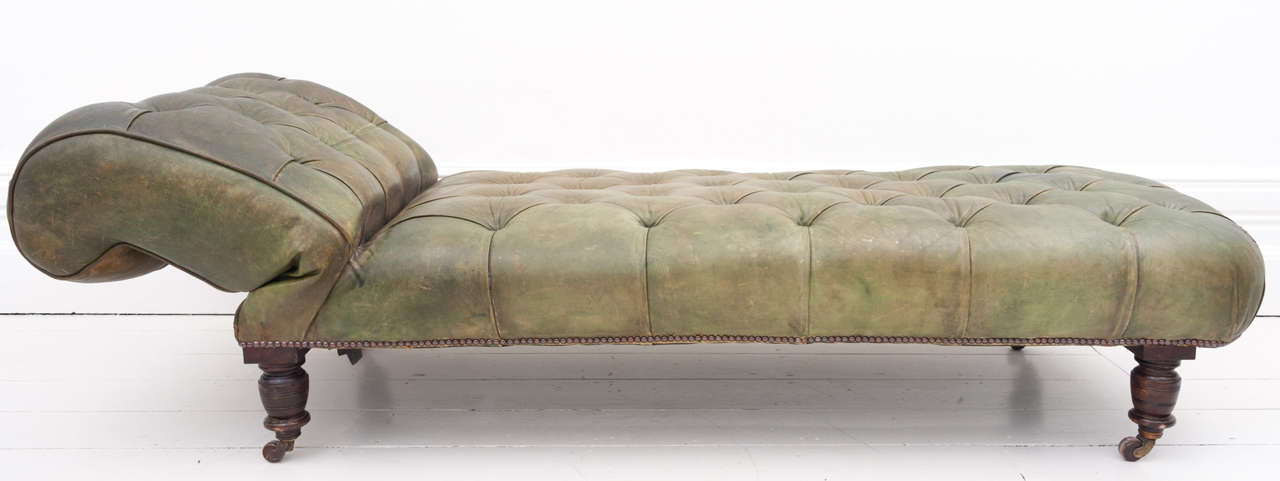 green leather chaise lounge