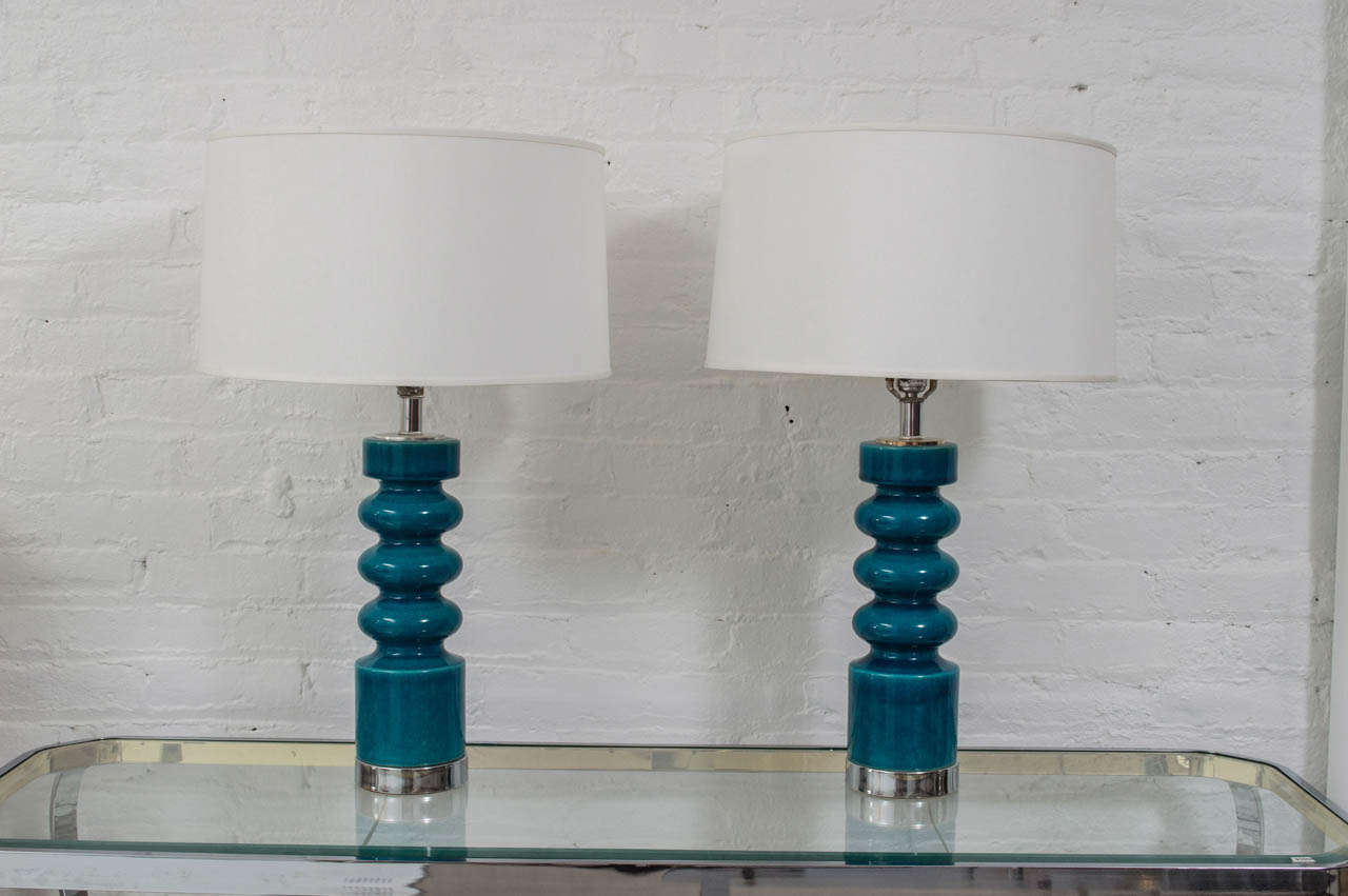 Beautiful pair of ceramics turquoise lamps.
Shades not included.