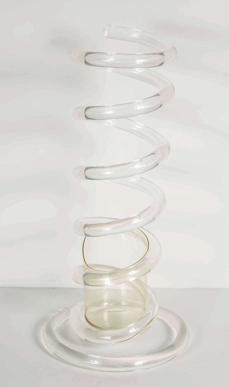 This lucite umbrella stand by Dorothy Thorpe has a whimsical spiral shape and will add a truly unique accent to any entryway.