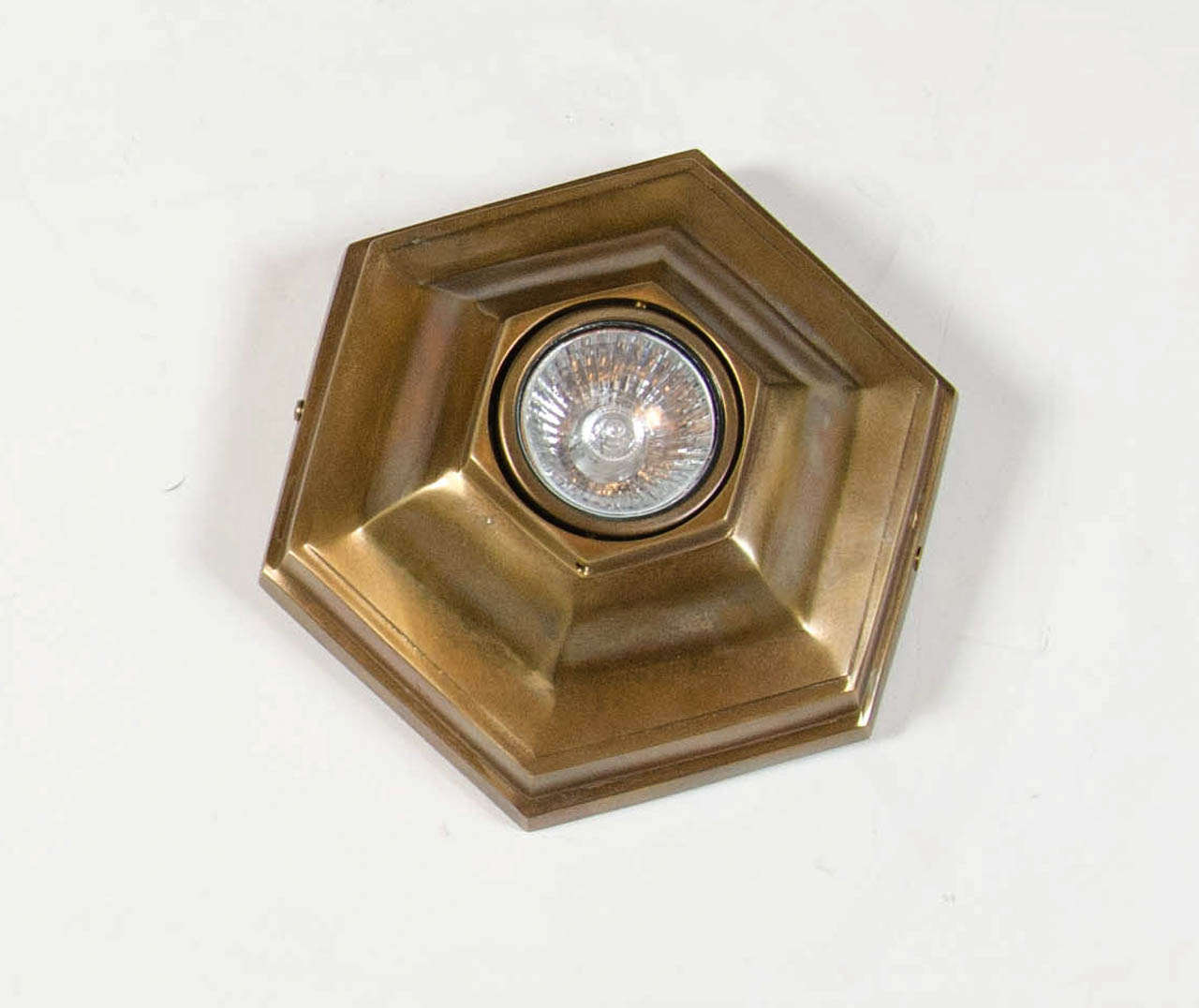 This octagonal Art Deco style spotlight is made of patinated bronze it also has a shadow box design as well,
France, 20th century.
Measures: Width 6
depth 6
height 5.9.