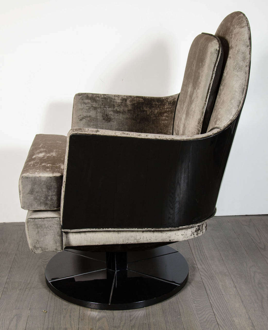 20th Century Pair of Mid-Century Modernist Swivel / Rocker Arm Chairs in Ebonized Walnut