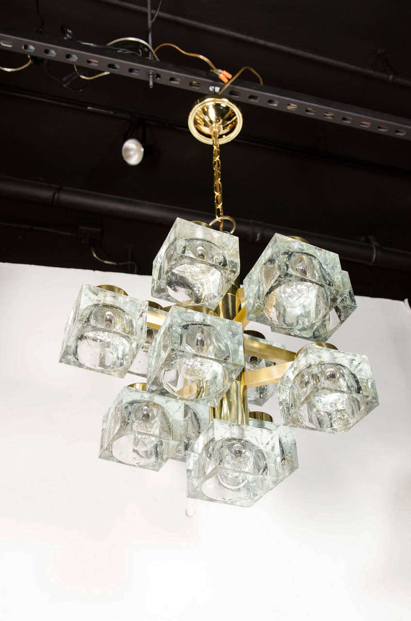 Mid-Century Modernist chandelier by Sciolari with textured glass cubes and brass fittings.