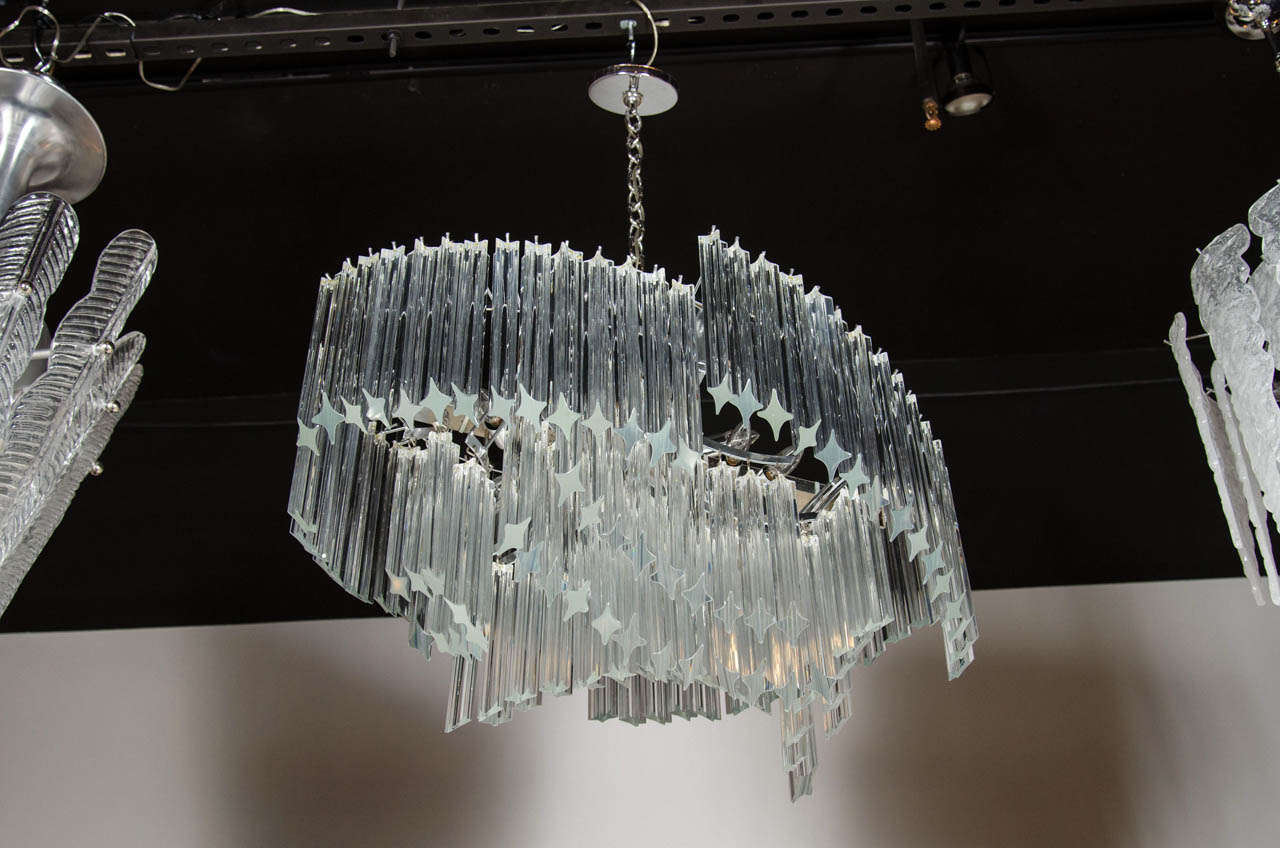 Great Mid-Century design of asymmetrical camera crystals with chromed fittings. Newly rewired and height can be adjusted tp suit . The crystal part of the chandelier is a height of 20