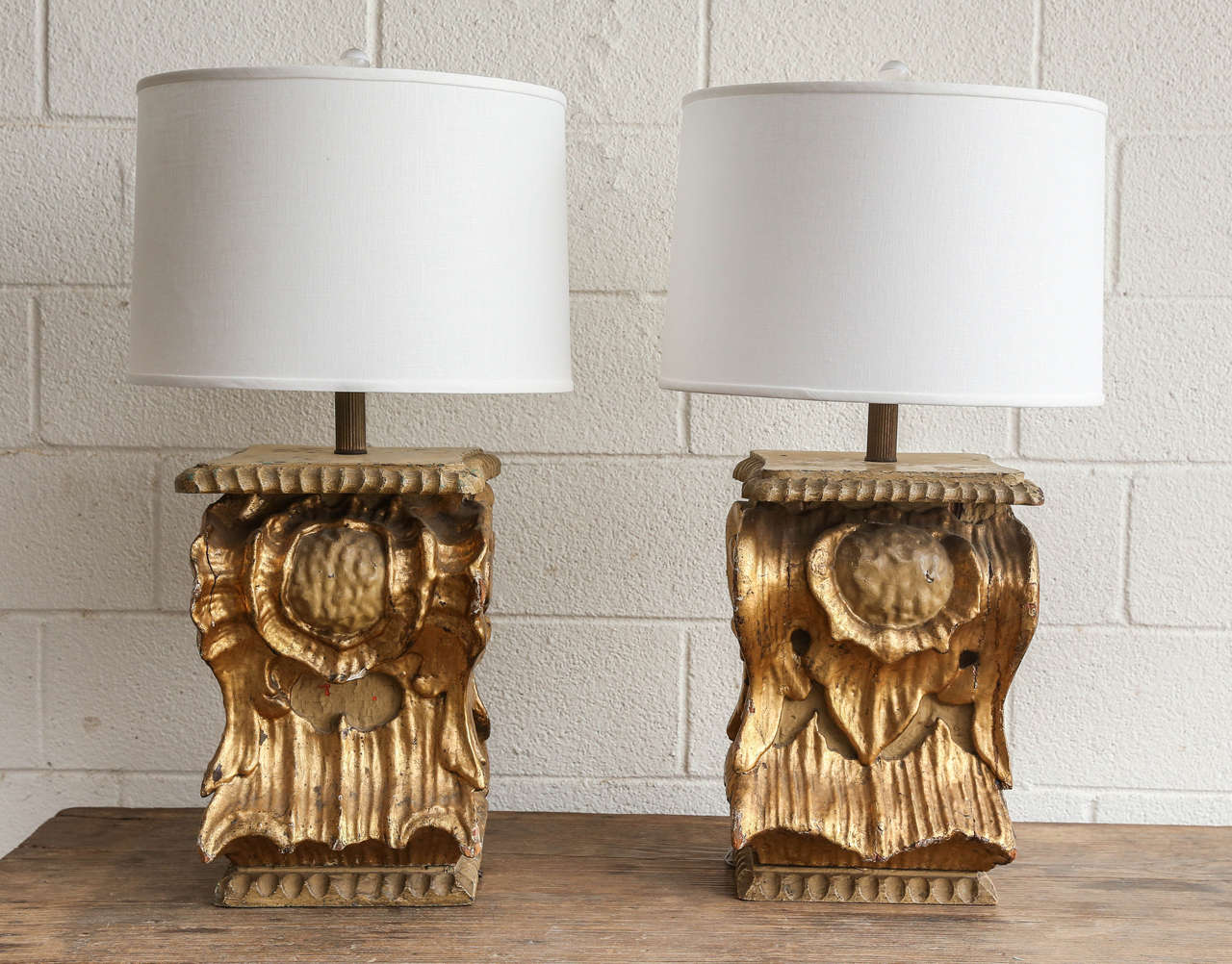Beautiful gold gilt lamps made with 19th century altar elements from an Italian cathedral.