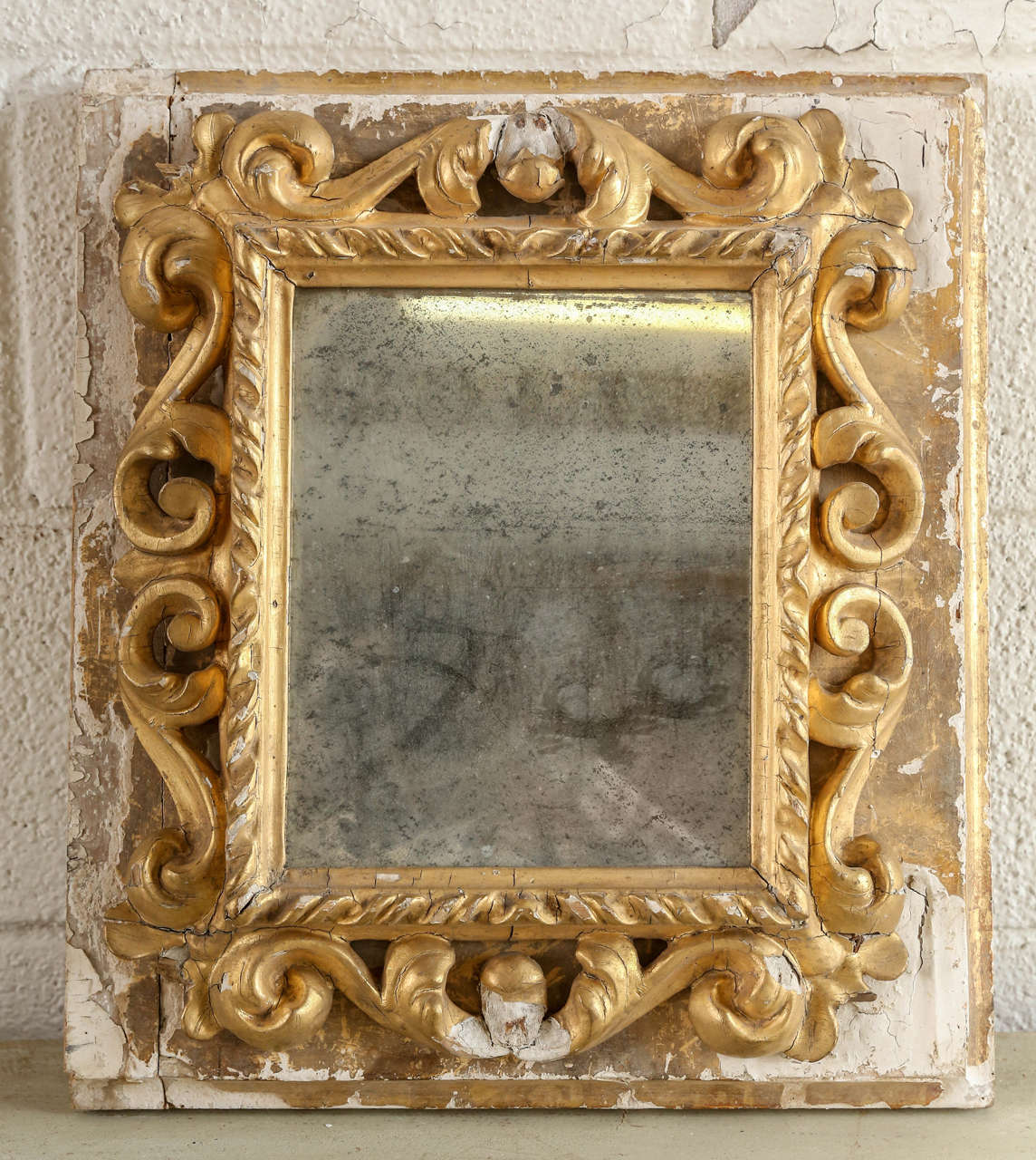 Early Italian gilt mirror.