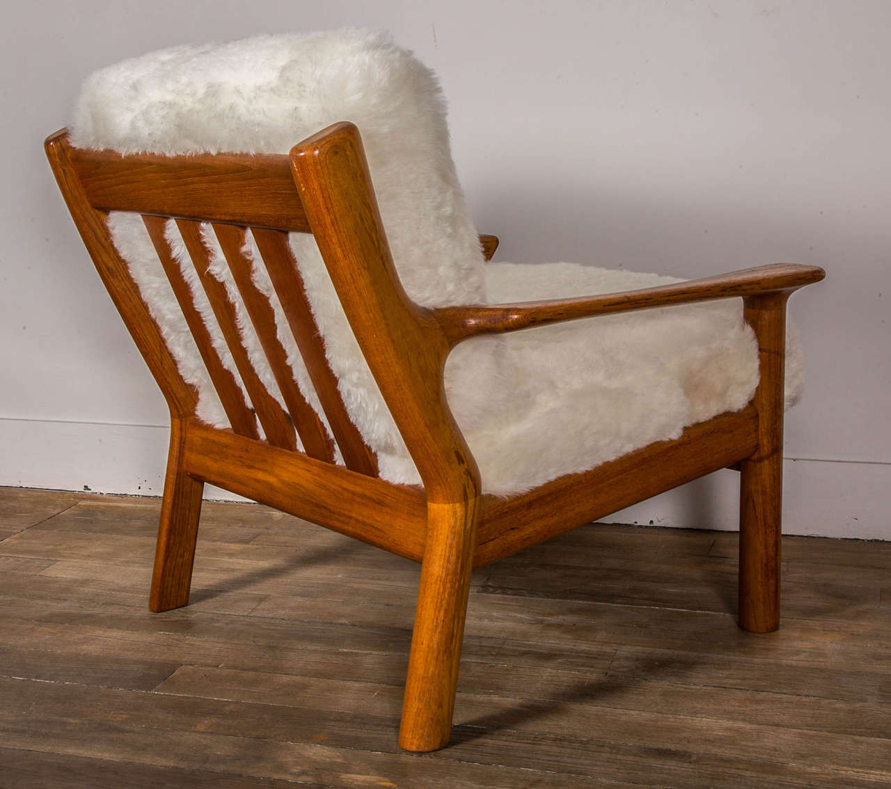 Scandinavian Modern Pair of Sheepskin Covered Lounge Chairs by Glostrup
