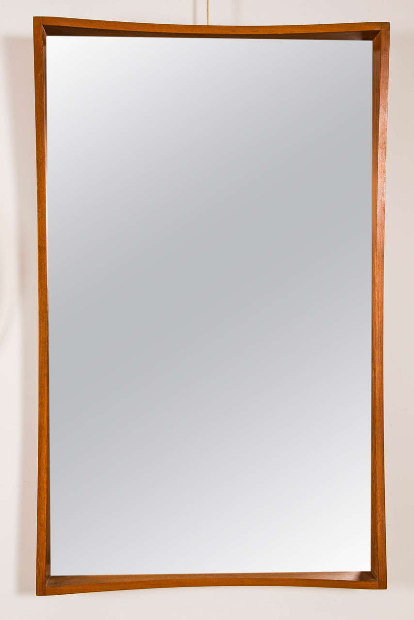 A pair of teak frame mirrors, designed and produced by Pedersen and Hansen (labeled).
Denmark, circa 1960.