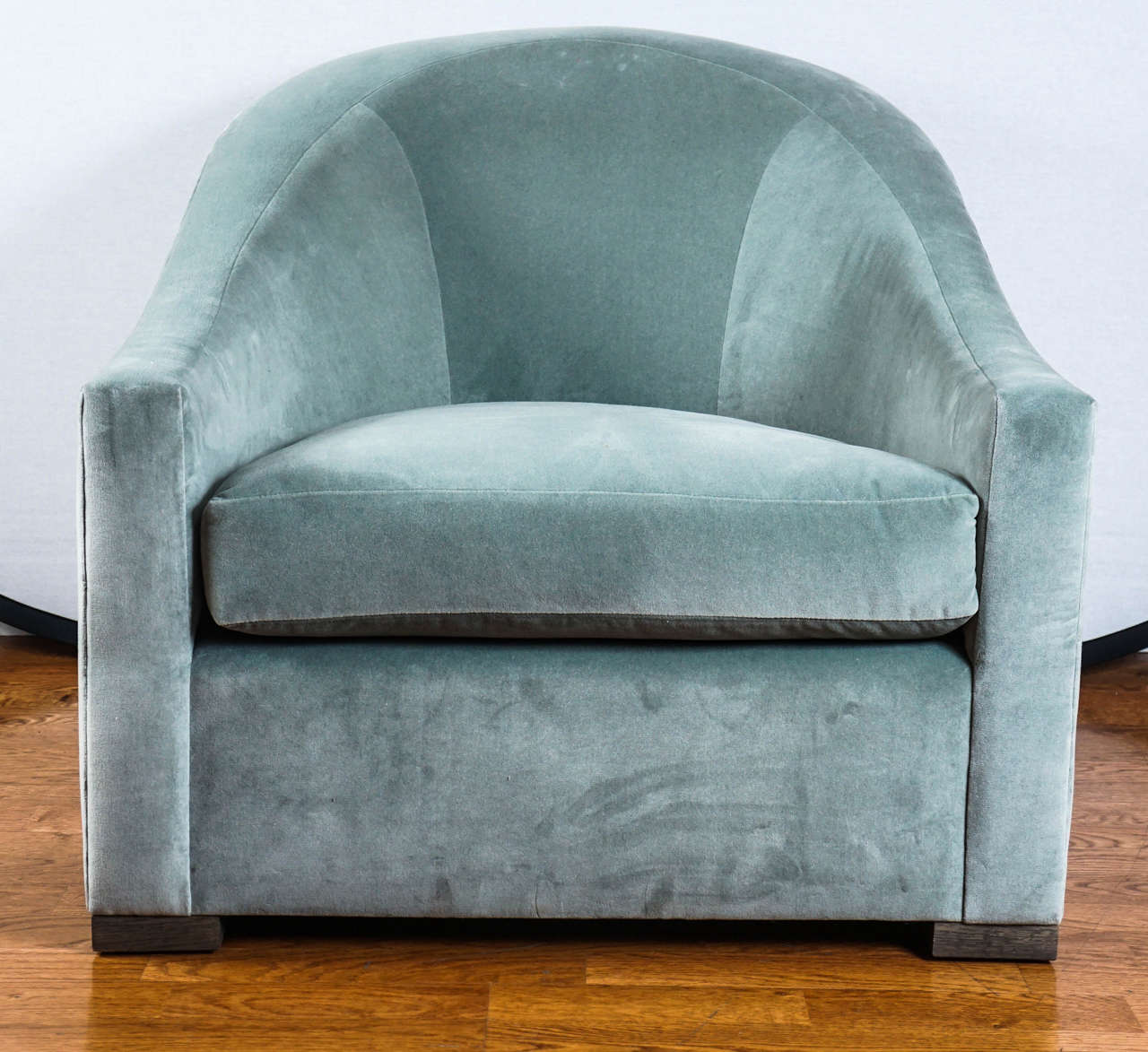 soft, calming, sea foam green velvet upholstered chair, by Designer, James Huniford.
with it's pleasing rounded back and square wooden feet, this club chair is not only beautiful, it's extremely comfy!