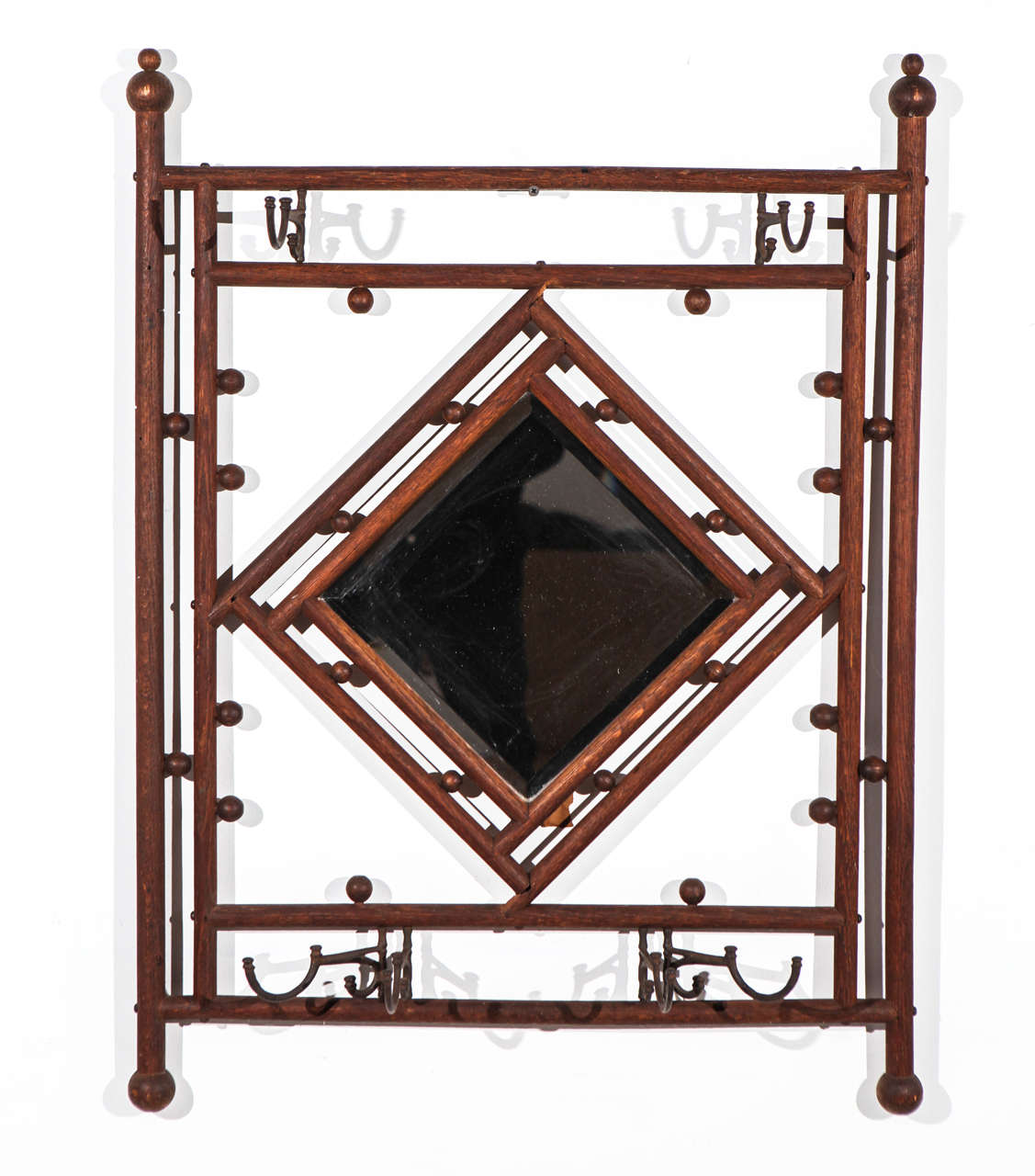 Rustic farm style wall rack with center square / diamond mirror.