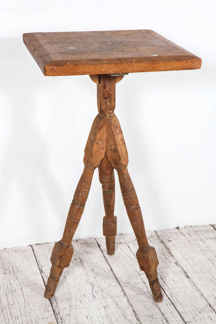 Rustic tall side table or plant stand.