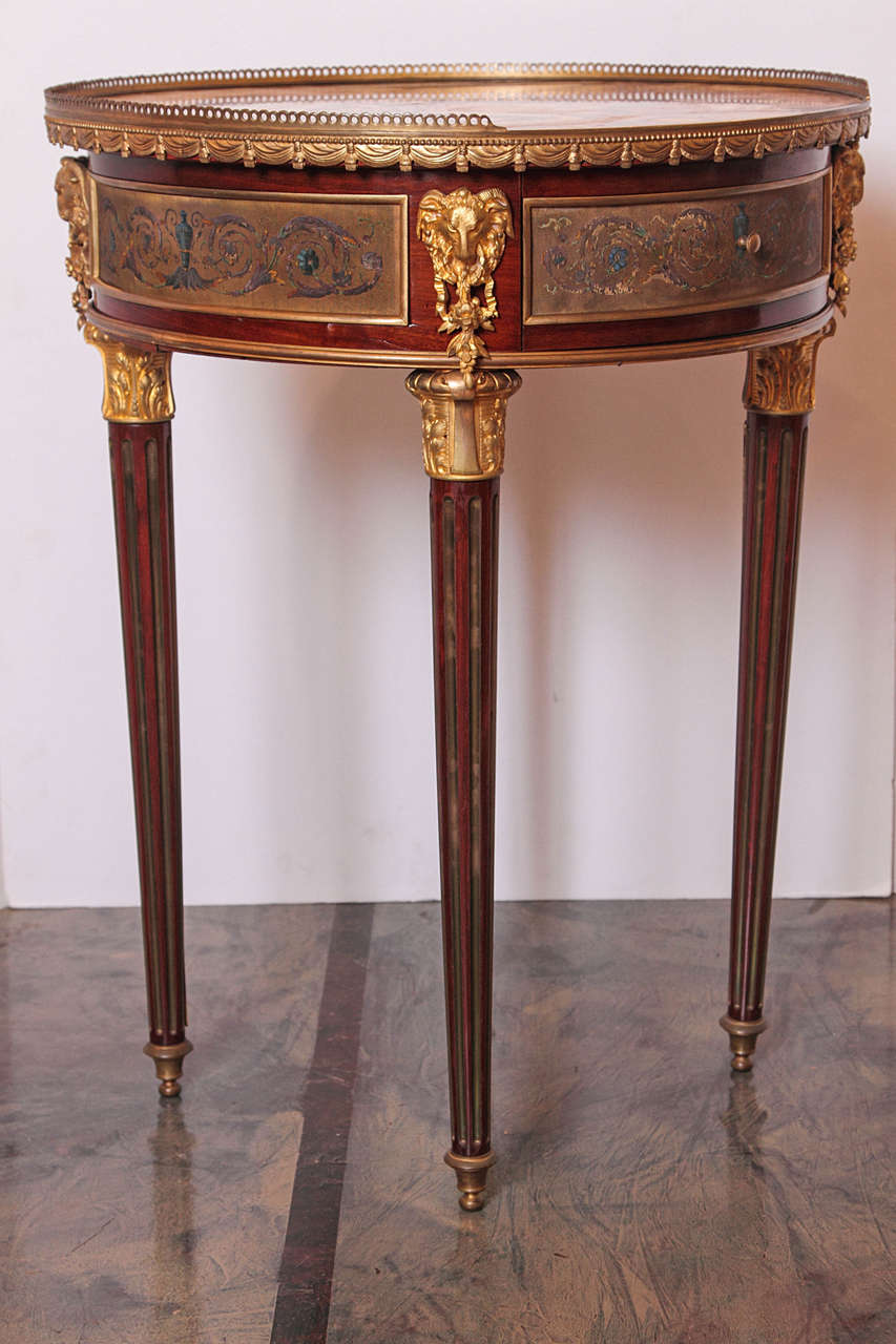 19th c French Louis XVI signed Krieger side table with beautiful marble top and painted bronze detail. Rams head gilt bronze mounts .Single drawer