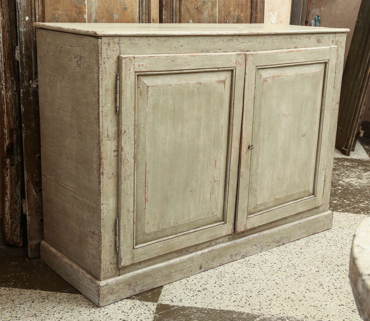 Late 18th - early 19th c. two door cabinet from Italy. Later painted and scraped finish.