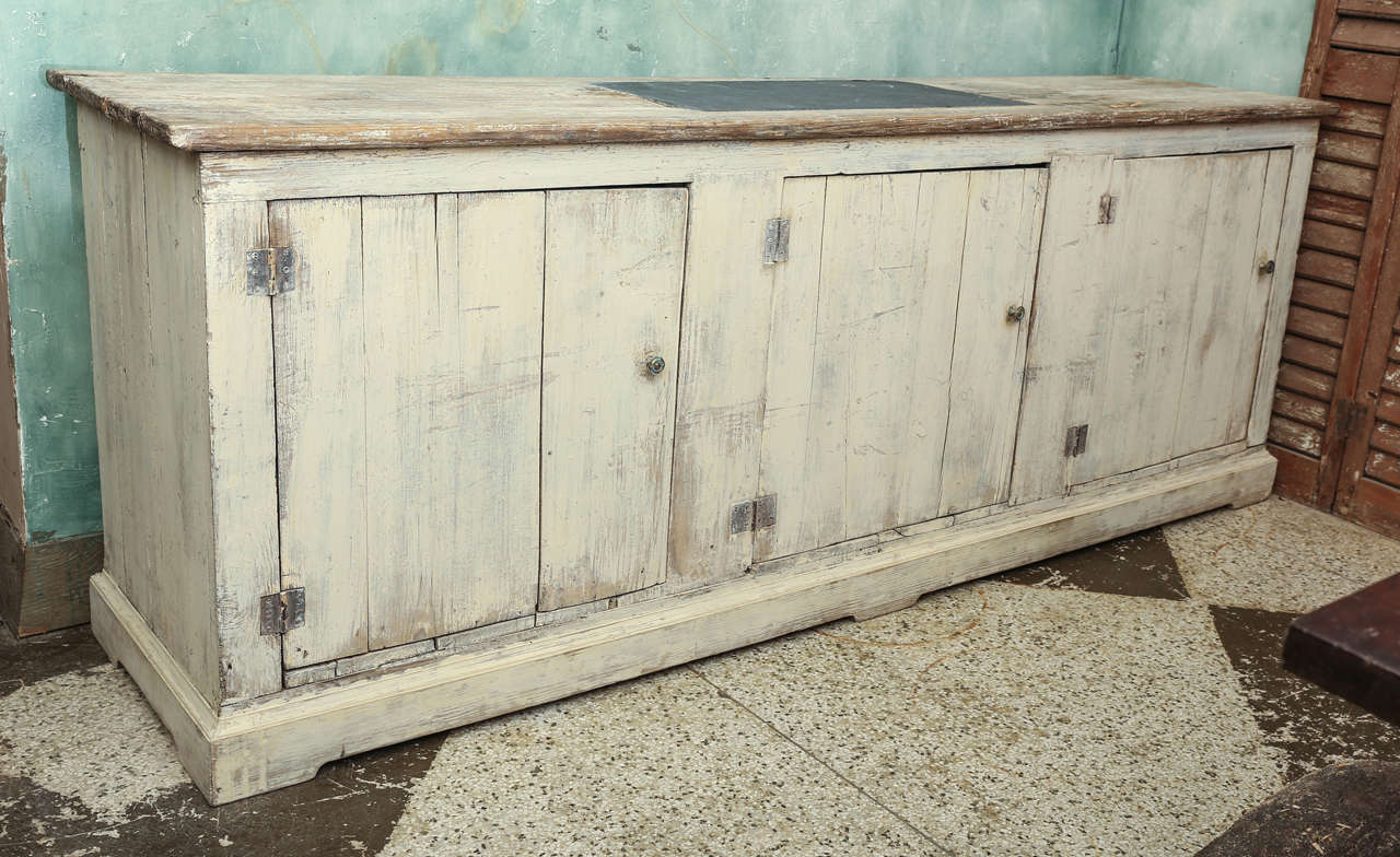 Late 19th - early 20th c shop counter/enfilade found in Provence. Painted oak with slate inset on top.