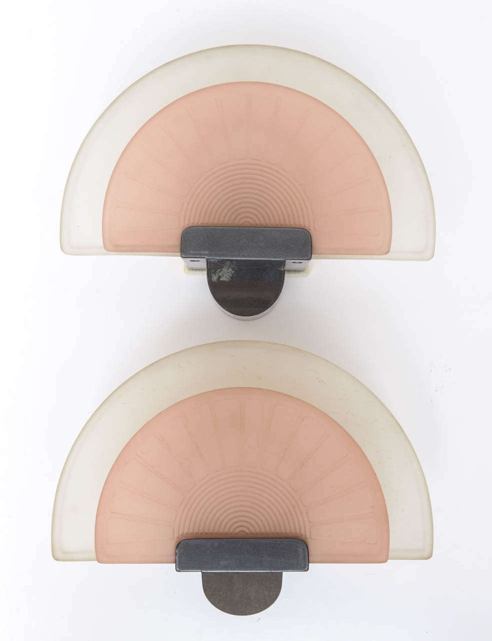 Diva shell sconces designed by Ezio Didone for Arteluce.