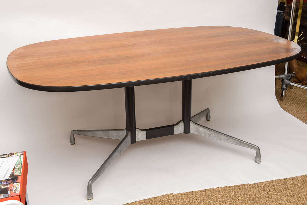 Conference table designed by Charles and Ray Eames for Herman Miller part of the Aluminum Group office furniture. 
Ashwood top and aluminum legs.
Marked underneath.