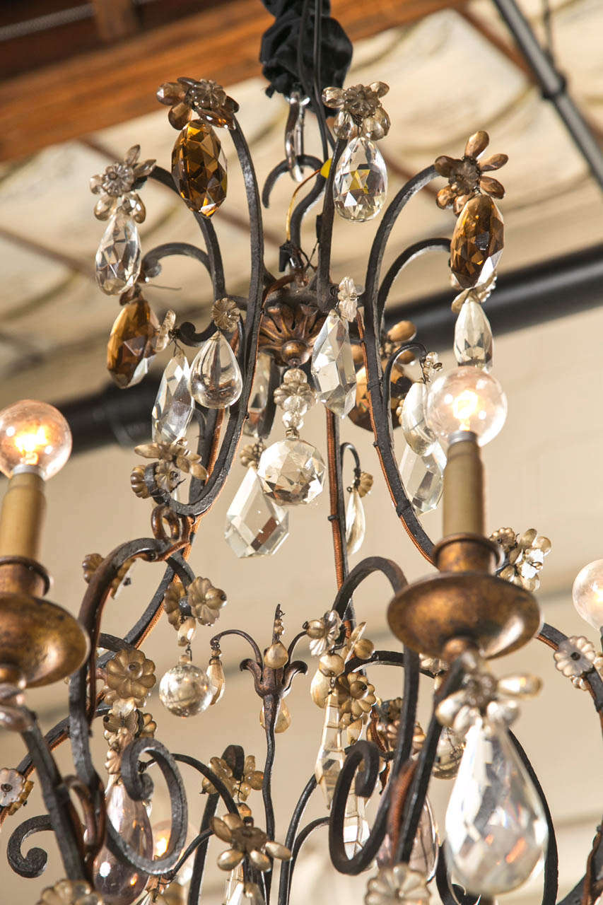 wrought iron and crystal chandeliers