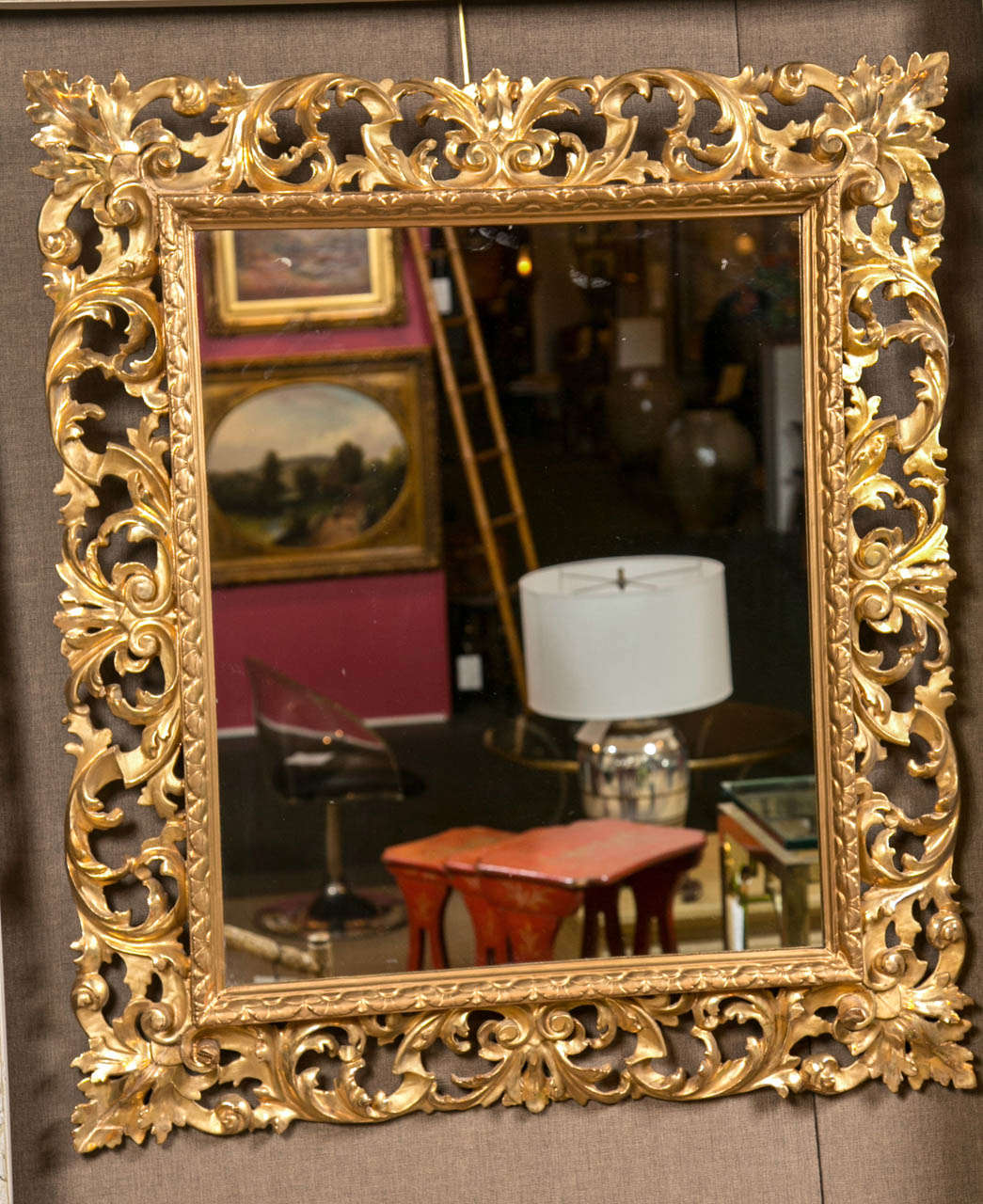 A pair of Italian gilt carved wood frames.  Cold gilt with excellent restoration and condition.