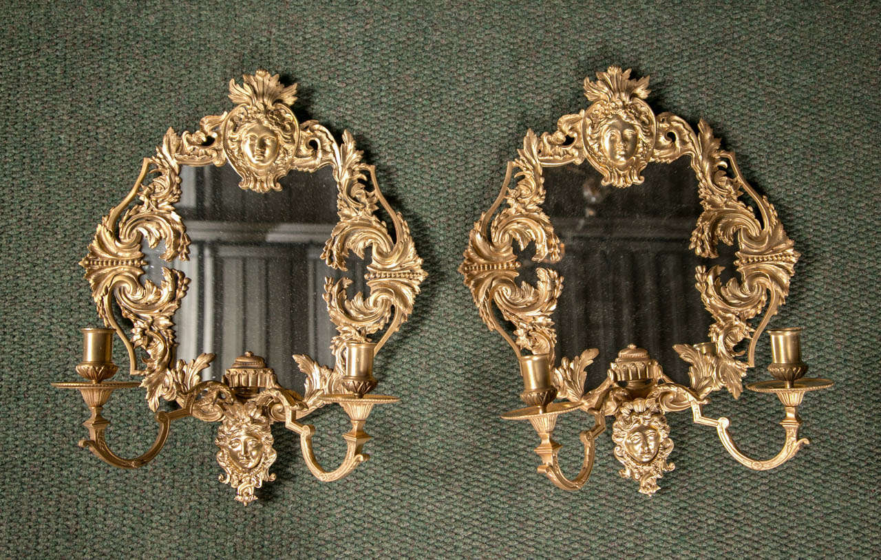 A pair of dore bronze, mirrored Louis XIV, 2-arm sconces.