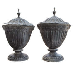 Pair of 19th Century Lead Covered Urns